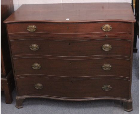 A GOOD GEORGE III MAHOGANY SERPENTINE FRONTED COMMODE with four long graduated drawers with brass handles and supported on br