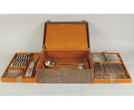 A GOOD FRENCH SILVER PLATED THREE DRAWER CANTEEN comprising: fish slice, soup ladle, cake slice, fork, salad servers, 12 tea 