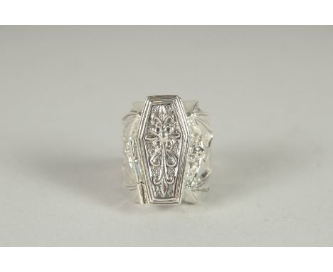 A SILVER COFFIN AND BAT SKELETON RING.
