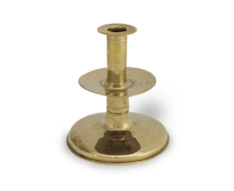 An unusual mid-to late 17th century brass alloy trumpet-based socket candlestick, English, circa 1650-80With unusually-trunca