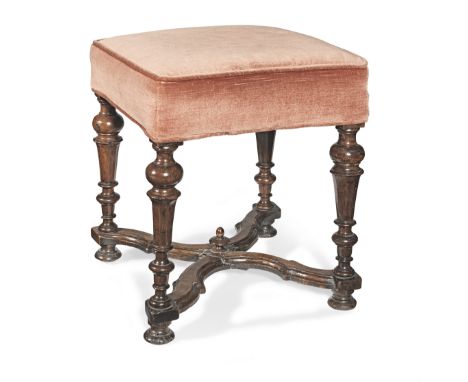 A William &amp; Mary walnut and upholstered stool, circa 1695In the manner of Daniel MorotHaving a square stuff-over deep sea