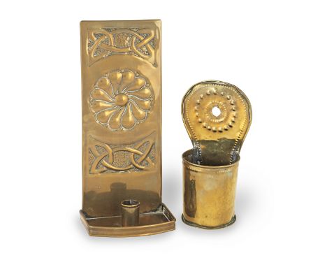 A Scottish Arts &amp; Crafts brass wall sconce, by J. &amp; Co., circa 1905The backplate with Celtic interlaced strapwork and