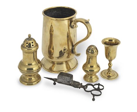 A George II brass tankard, circa 1740Of quart capacity, with rolled rim and of baluster form with flared foot, 17.5cm high, t