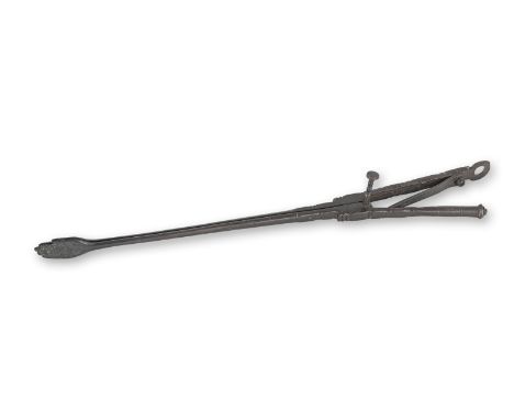 A rare pair of Charles II steel ember tongs, circa 1680With decorative chamfers and notches, and terminating in a pair of nip