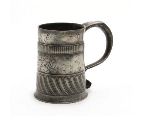 An extremely rare and fine Queen Anne pewter gadrooned mug, ale-pint capacity, circa 1705Touchmark inside base of John Comper