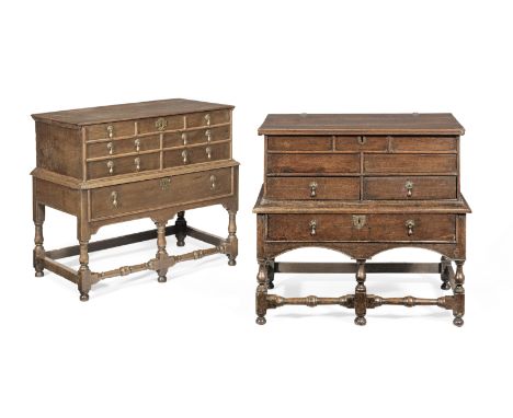 Two similar William &amp; Mary joined oak and elm boxes-on-stands, circa 1690Each dove-tailed box-top with hinged boarded lid