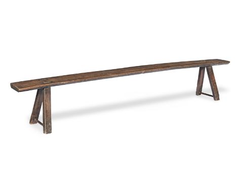 An 18th century ash long bench, EnglishHaving an impressive thick single board top, with chamfered under edge, on rectangular
