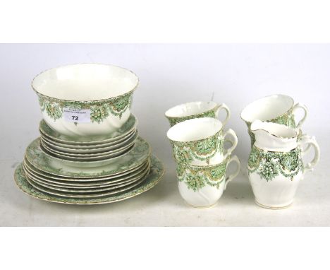 A Sutherland China green and white six person tea set. Comprising six cups and saucers, plates, a milk jug, serving plate, et