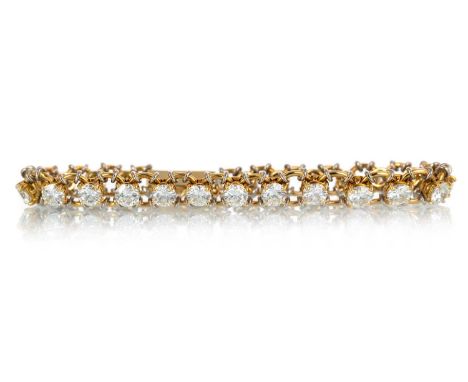 IMPRESSIVE MAPPIN AND WEBB DIAMOND BRACELET, set with graduated round brilliant cut diamonds totalling approximately 11.50 ca