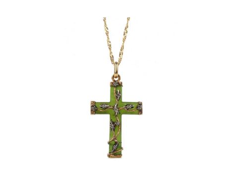 JADE AND DIAMOND CROSS PENDANT, the jade cross with overlaid vine, set with diamond chips, marked 18K, on a nine carat gold c