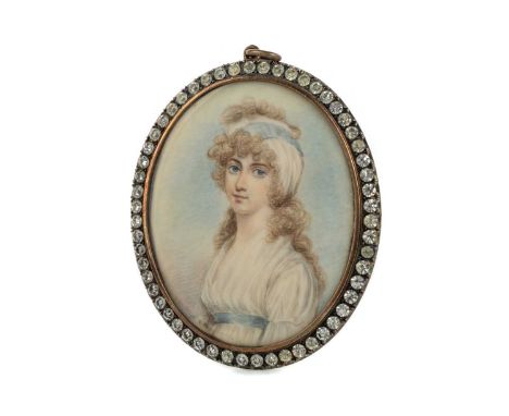 PORTRAIT MINIATURE,  painted on ivory within a border of paste stones, silver gilt, in fitted caseThis lot contains elephant 