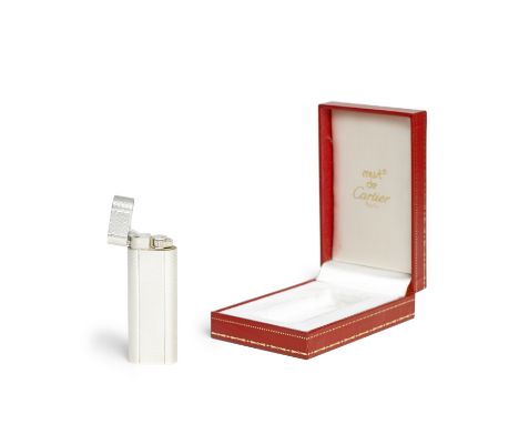 CARTIER: GOLD PLATED LIGHTEROf rectangular form with engine turned finish and rounded ends, Underside of base signed Cartier 