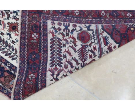 A vintage hand knotted rug - 170cm x 130cm