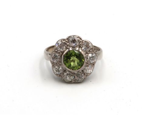 An 18ct White Gold Vintage Diamond and Peridot Ring, Head Size approx. 14mm Diameter, Ring Size approx. L/M, approx. 1.25crts