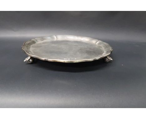 A hallmarked silver circular salver on tripod feet, no engraving, 20cm diameter, weight approx 9.9 troy oz