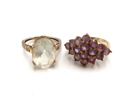 A 9ct gold pink gem cluster ring. Size N. Weight 2.93 grams. Together with a an aquamarine and diamond ring stamped 925. Size