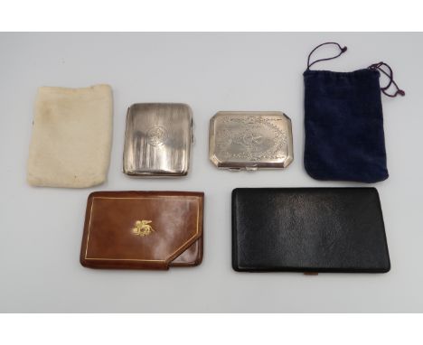 Two silver cigarette cases, one of curved form, with engine turned decoration, and gilt interior, monogram engraved and with 