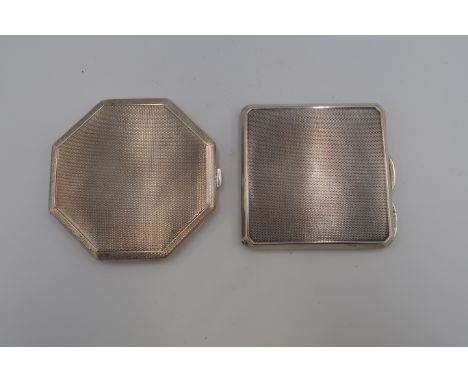 Two vintage silver compacts, one of octagonal form, the other of square form with canted corners, both with engine turned dec