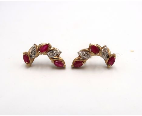 A pair of ruby and diamond curved earrings. Test 14ct. Weight 2.39 grams.