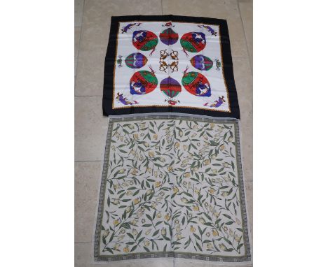 A vintage Hermes silk scarf decorated with eight colourful balloons and golden cherrubs, 90 by 90cm,  together with a Gianni 