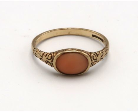 A 9ct gold coral ring. Size P. Weight 1.61 grams