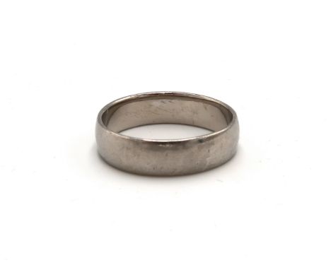 A platinum 6mm band ring. Size U. Weight 6.12 grams