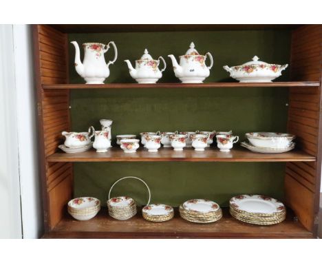 A Royal Albert, Old Country Roses part tea and dinner service comprising two tea pots, coffee pot, two handled vegetable dish