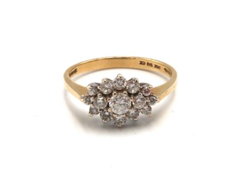 A 14ct gold and cubic zirconia dress ring of flowerhead and leaf form, size P, 2.3g.