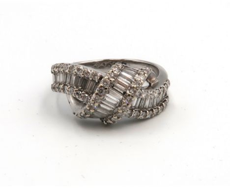 An 18ct White Gold Baguette Cut and Brilliant Cut Diamond Bow Ring, approx. 1.65crts of Diamond, Head Size approx. 21mm x 11m