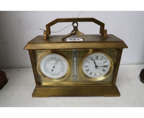 A brass desk clock with barometer, thermometer and clock, Frodsham London