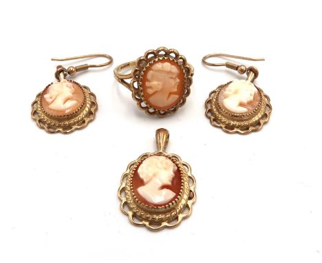 A collection of 9ct gold cameo jewellery. To include a ring, size S 1/2, a pendant and a pair of ear pendants. Total weight 9