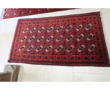 A vintage hand knotted rug - 200cm x 107cm