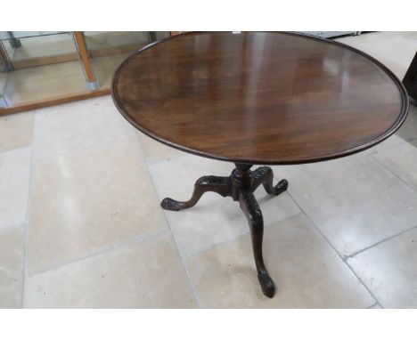 A good quality mahogany tripod table, late 19th century on a wrythern base and three carved cabriole legs - 80cm diameter dis