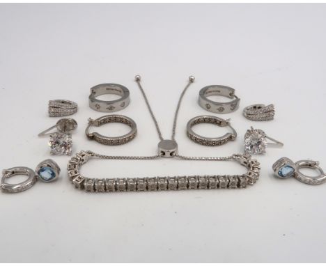 A QVC silver and diamond set half tennis bracelet, with box chain and button adjusting clasp, fully hallmarked to the clasp, 