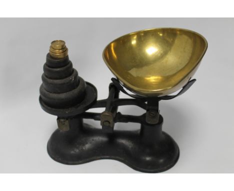 A SET OF SCALES TOGETHER WITH A QUANTITY OF WEIGHTS 