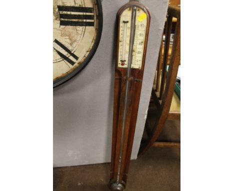 A MAHOGANY STICK BAROMETER MADE IN BLOXWICH 
