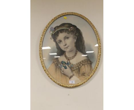 AN OVAL FRAMED AND GLAZED PORTRAIT OF A GIRL 