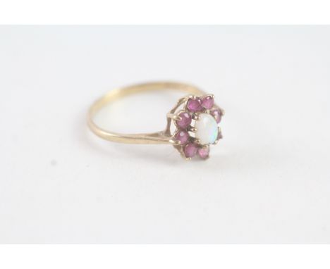 A 9CT GOLD VINTAGE OPAL AND RUBY CLUSTER RING Weight: 1.4 gms