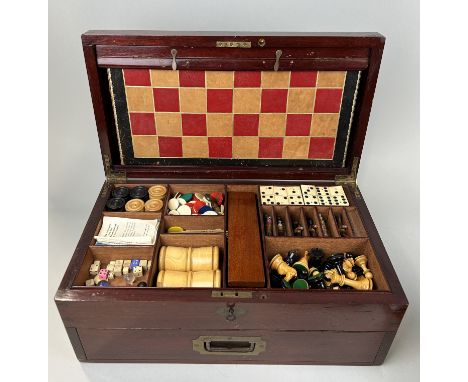 A FINE ANTIQUE CASED GAMES SET WITH CHESS, DRAUGHTS, HORSE RACING GAMES, CROQUETThe case 45cm x 25cm x 19cm