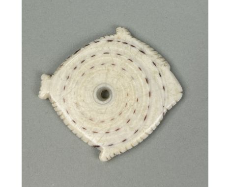 AN ANTIQUE TRIBAL CARVED SHELL 'FISH' PENDANT PROBABLY SOUTH SEA ISLANDS5.2cm x 5cmCollected by Captain James Muddle.James Mu