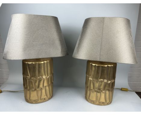 A PAIR OF DESIGNER CURTAIN TABLE LAMPS65cm H each with shades.