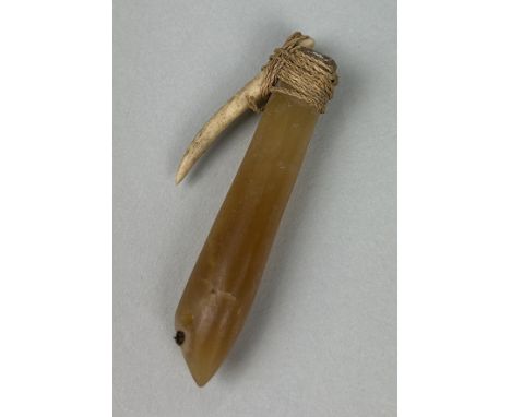 A 19TH CENTURY TRIBAL FISH HOOK PROBABLY SOUTH SEA ISLANDSCrafted from bone and stone possibly agate, tied together with stri