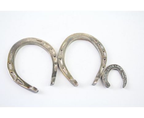 THREE STERLING SILVER LUCKY HORSE SHOE TOKENSWeight: 53gms