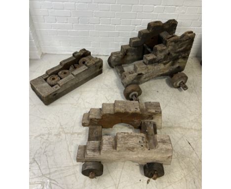 A GROUP OF THREE ANTIQUE CANNON CARRIAGESLargest 74cm x 54cm x 35cm