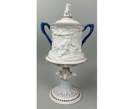 A STAFFORDSHIRE PARIAN WARE TWIN HANDLE URN AND COVER ATTRIBUTED TO GEORGE JONES38cm x 22cmThe urn depicting hunting scenes, 