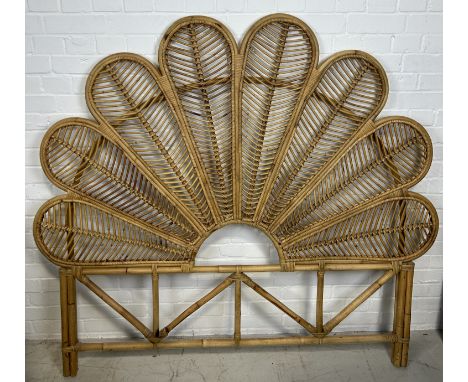 A DECORATIVE RATTAN HEADBOARD 152cm x 146 cm