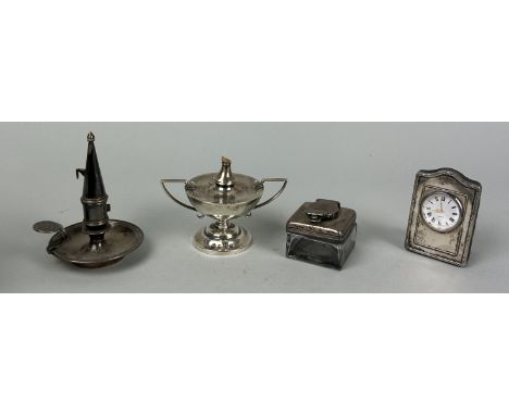 A GROUP OF FOUR SILVER ITEMS (4)To include a clock, candleholder, inkwell etc.