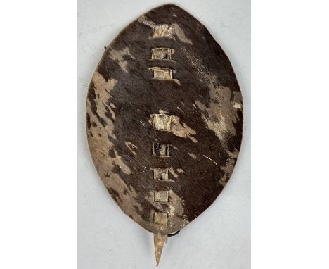 A TRIBAL ANIMAL HIDE SHIELD FROM THE COLLECTION OF CAPTAIN JAMES MUDDLEProbably South Sea Island25cm x 16cm James Muddle was 