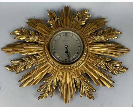 A GARRARD AND CO GILT WOOD SUNBURST WALL CLOCK63cm x 46cm