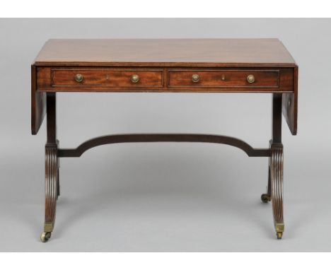 A 19th century mahogany sofa table
The moulded twin flap rectangular top above two frieze with two opposing dummy drawers, st